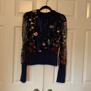 Beautiful top with sheer sleeves